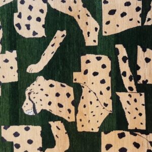 Cheetah Broken on Green Carpet